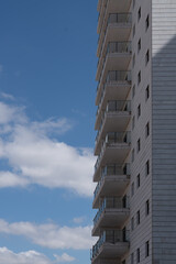 Vertical line of tall balconies pattern