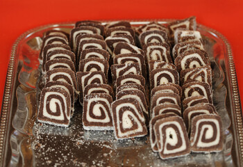 Slices of chocolate and coconut roll cake