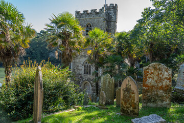 Church on sea coast with palm trees in Cronwalls, United Kingdom