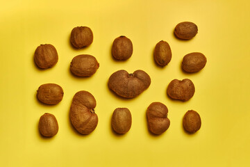 Kiwis on yellow background