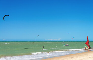 Fototapeta na wymiar Kait surfing at Cumbuco Beach, Fortaleza, Ceara, Brazil