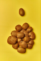 Kiwis on yellow background