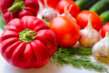 Good organic cucumbers and red tomatoes and garlic