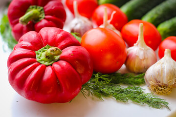 Good organic cucumbers and red tomatoes and garlic
