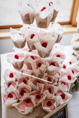 Raspberry Cupcakes Displayed at Wedding