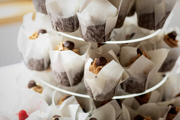 Fototapeta na wymiar Chocolate Cupcakes Displayed at Wedding