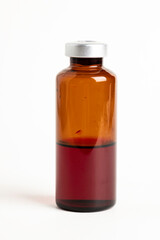 Macro Image Of Amber Vaccine Vial In White Background