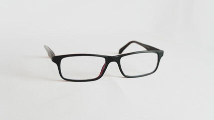 Black glasses for intellectual people on white background, glasses for better reading