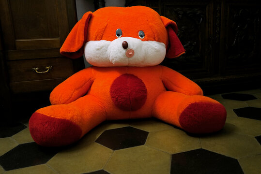 A giant orange teddy bear