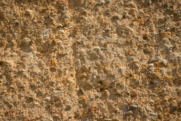 Natural yellow stone background with texture