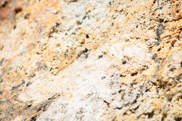 Natural yellow stone background with texture