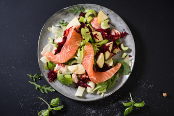 Top view on fresh salmon salad