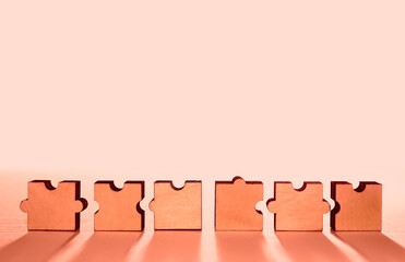 6 six Puzzles on wooden table. isolated on white background.