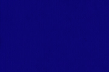 Clean purple retro paper background. Vintage violet cardboard texture. Grunge paper for drawing. Simple blank fabric pattern.