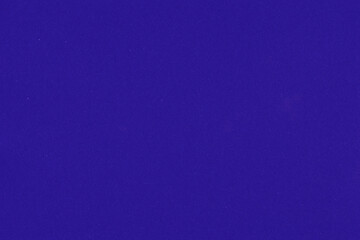 Clean purple retro paper background. Vintage violet cardboard texture. Grunge paper for drawing. Simple blank fabric pattern.