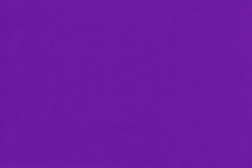 Clean purple retro paper background. Vintage violet cardboard texture. Grunge paper for drawing. Simple blank fabric pattern.