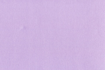 Clean purple retro paper background. Vintage violet cardboard texture. Grunge paper for drawing. Simple blank fabric pattern.