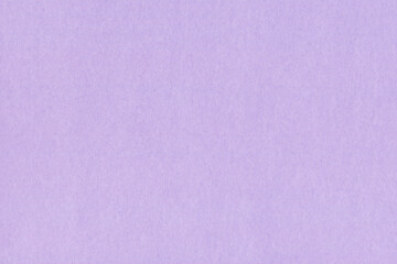 Clean purple retro paper background. Vintage violet cardboard texture. Grunge paper for drawing. Simple blank fabric pattern.