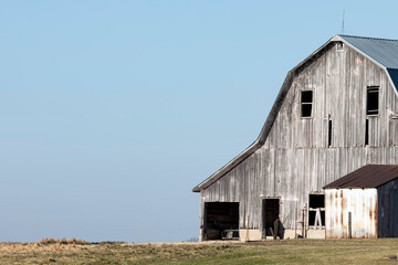 Old Wood Barn against a Blue Sky