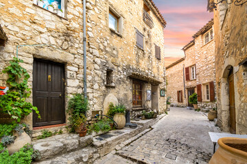 A charming, picturesque back street in the medieval walled village of Tourrettes-Sur-Loup in the Alpes-Maritimes area of Southern France.
