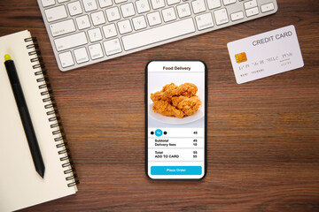 holding phone with application delivery food