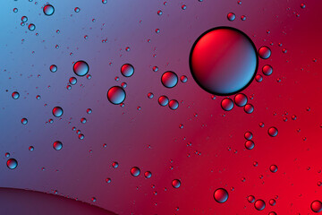 Blue and red bubbles. Abstract background. Bubble oil on water. Macro-photography.