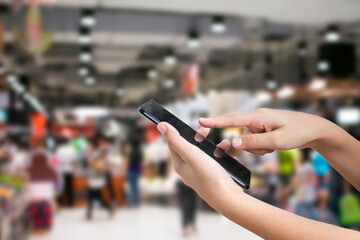 Business people hold smartphone and online shopping concept.