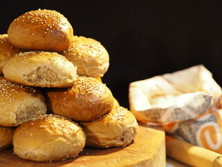 Soy and banana bread with black background and  sack of flour and Wooden roller