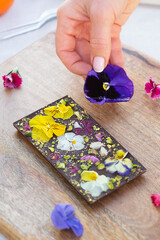 Modern chocolate prepared with beautiful edible flowers