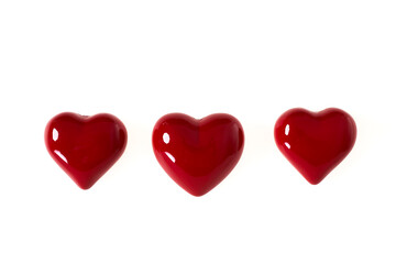 red hearts of love on white