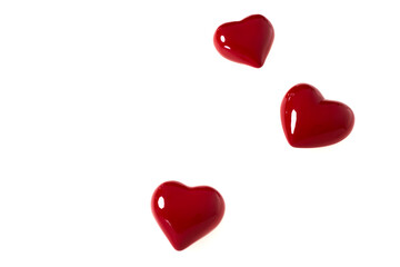 red hearts of love on white