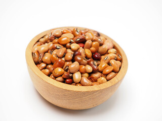 Close up shoot of 'tolo beans' or Vigna unguiculata subsp. unguiculata, one kind of beans that usually processed as food ini Indonesia, capture on white background