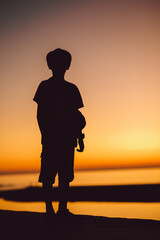 silhouette of a person on the beach