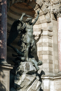 Fountain of St. Michael with sculptures of the archangel and the defeated serpent. Paris, France.