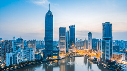 Obraz premium Evening scenery of CBD buildings in Northwest Lake, Hankou, Wuhan, Hubei, China