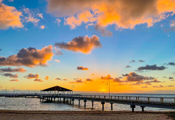 Fototapeta na wymiar Redcliffe Jetty on Moreton Bay at Sunrise