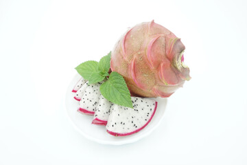 Fresh white dragon fruit on white background