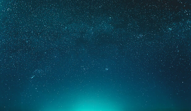 Night Sky Glowing Stars Background Backdrop With Sky Gradient. Colourful Night Starry Sky In Blue Aquamarine Colors