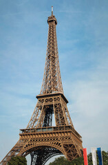 Fototapeta na wymiar Eiffel Tower in Paris against the blue sky, bottom view.