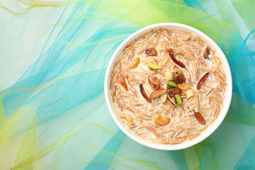 Khir or kheer payasam also known as Sheer Khurma Seviyan consumed especially on Eid or any other festival in india/asia. Served with dry fruits toppings in a ceramic bowl
