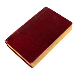 Old vintage book with a red cover isolated on a white background