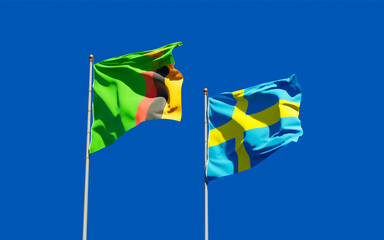 Flags of Zambia and Sweden.