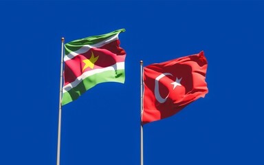 Flags of Suriname and Turkey.
