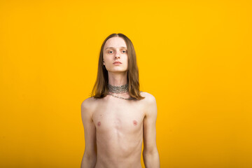 Androgynous beautiful young man. Model tests in studio.