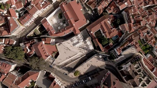 Portugal Aerial drone travel video Alfama Neighborhood during a daily scenic view. It is the most popular and touristic Neighborhood in Lisbon, Portugal.