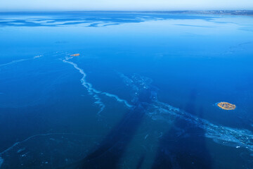 Shadow of the Church of the Forty martyrs of Sebaste on Pleshcheyevo lake ice. Pereslavl-Zalessky, Yaroslavl Oblast, Russia.