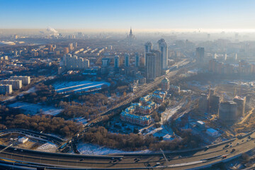 Contre-jour aerial view of Moscow (Ramenki district) at sunny winter day. Russia.