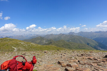 Backpack on top of the german alps