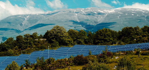 Solar panels in a large countryside in the mountains of the Abruzzo region, Italy