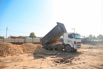 Excavators, machine on the workplace, Bulldozer  on cloudy day